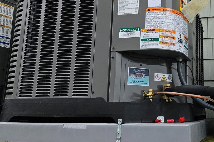 Outdoor unit shown during an AC capacitor replacement in Manasquan NJ