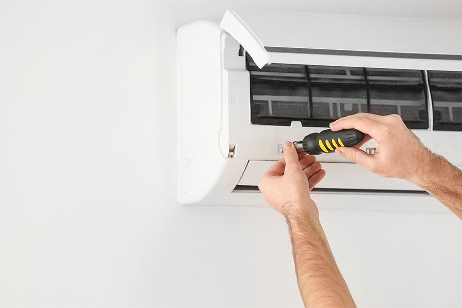 Ductless HVAC replacement work on a wall unit by 1st Choice Air Comfort